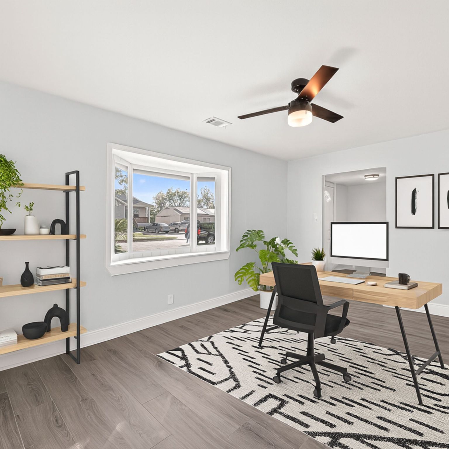 4729 Paradise Lane Houston, TX 77048 - Photo 9 of 43 a workspace with furniture and a window