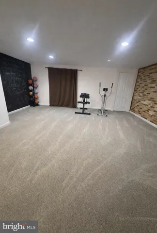 a view of a livingroom with a staircase