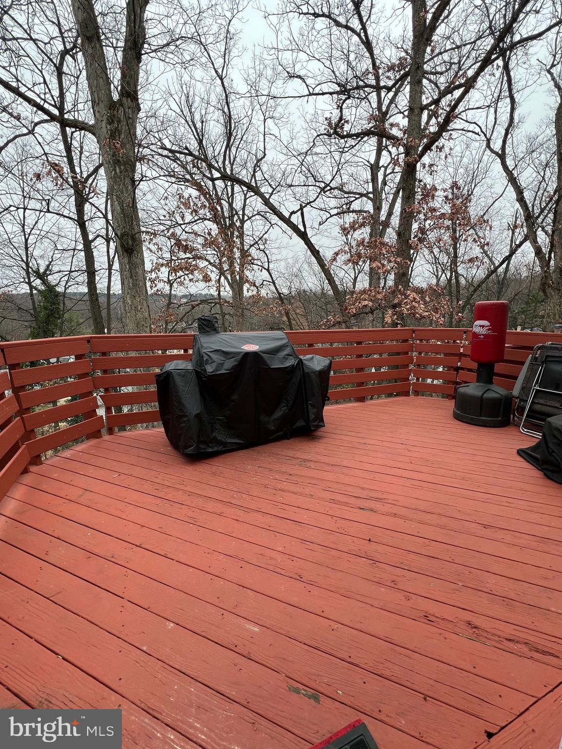8415 Snowden Oaks Place Laurel, MD 20708 - Photo 3 of 4 Deck with serene wooded view