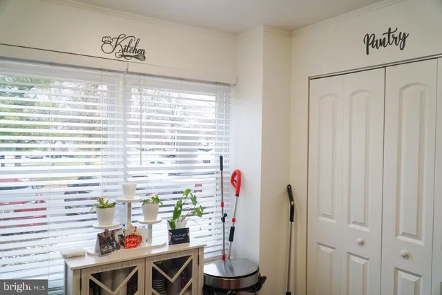 a room with a table and a window