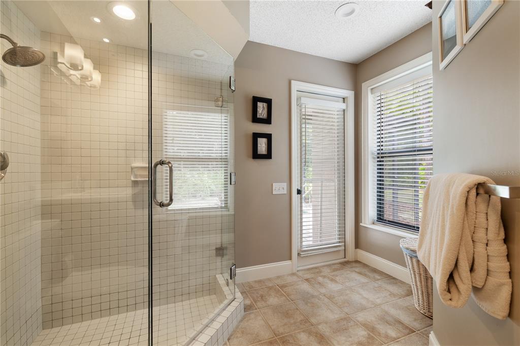 3372 Brian Road South Palm Harbor, FL 34685 - Photo 30 of 45 a bathroom with a tub and shower