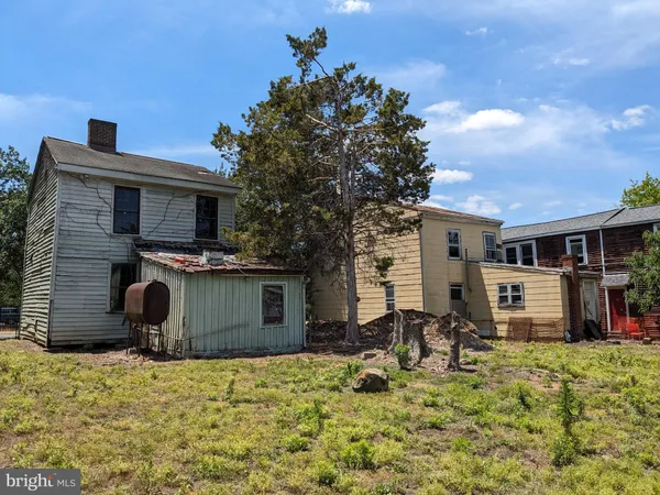 a house view with a backyard space