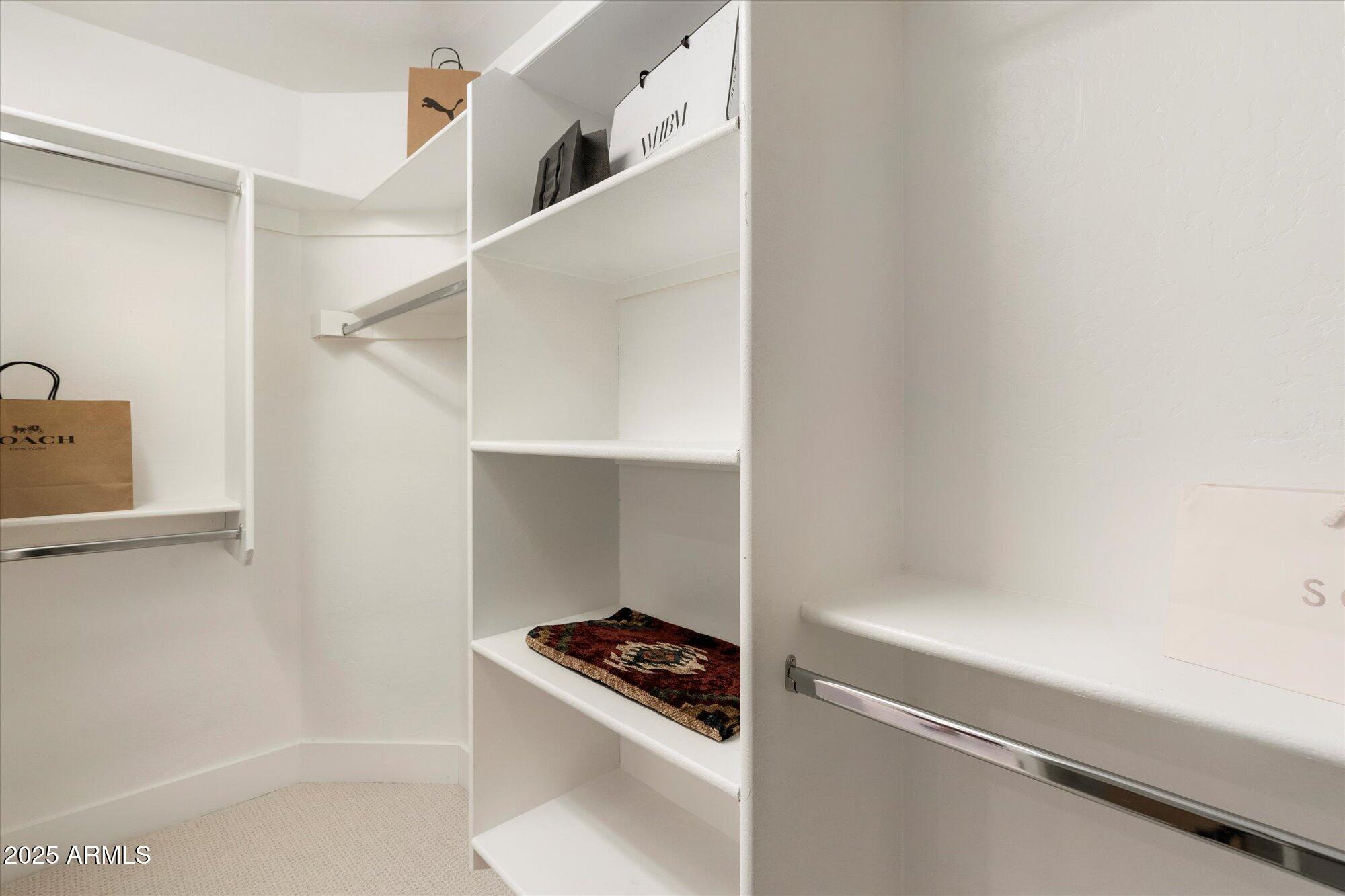 7955 East Chaparral Road, Unit 17 Scottsdale, AZ 85250 - Photo 26 of 57 Primary Walk-In Closet