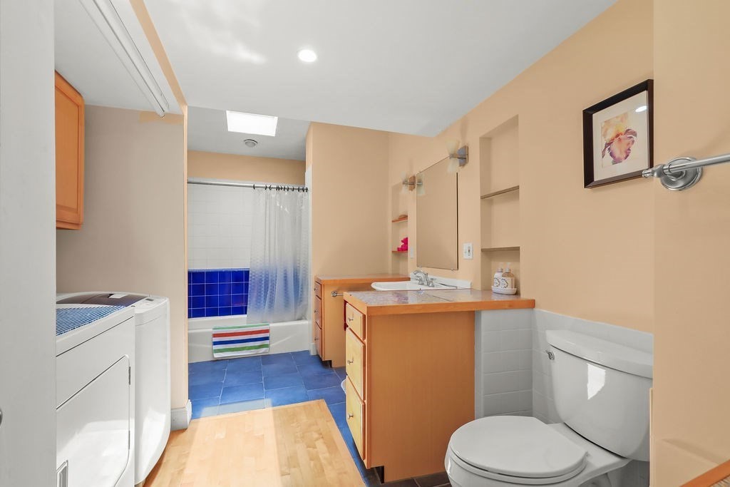 94 Fearing Hill Road Wareham, MA 02576 - Photo 13 of 41 a bathroom with a sink toilet and mirror
