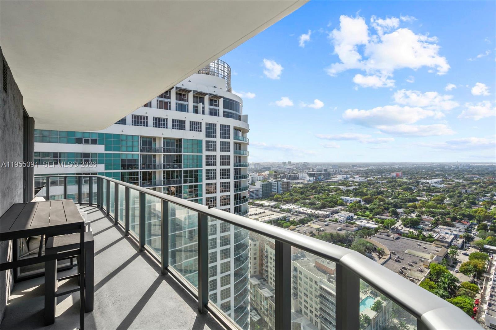 121 Northeast 34th Street, Unit 3001 Miami, FL 33137 - Photo 11 of 13 a view of a balcony with city view