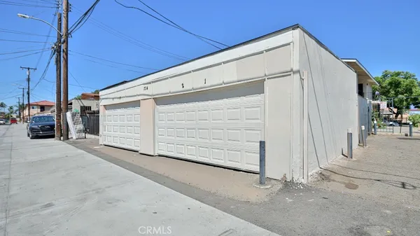 a view of house with garage
