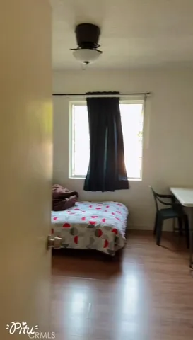 a bathroom with double vanity and a bathtub