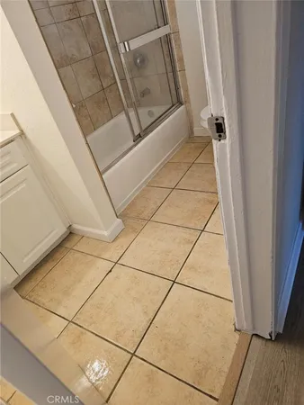 an aerial view of a houses with yard