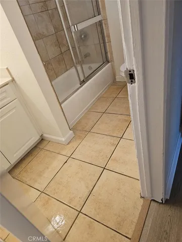 an aerial view of a houses with yard