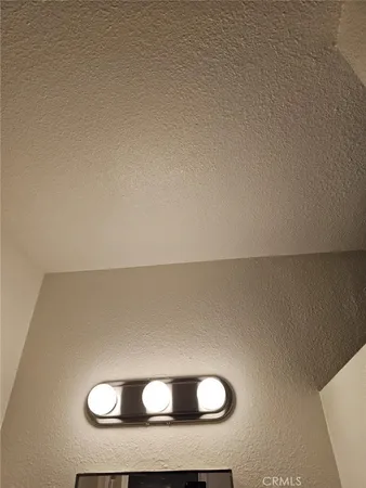 an aerial view of multiple houses with outdoor space