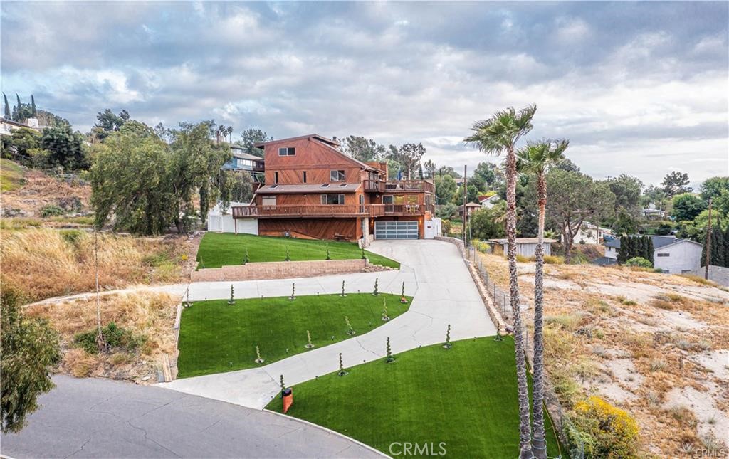 20242 West Point Drive Riverside, CA 92507 - Photo 1 of 1 a view of a house with a yard and sitting area