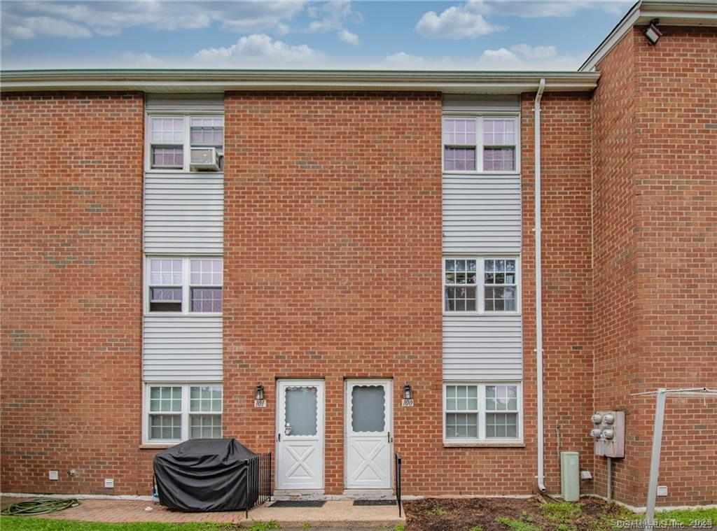 79 Beths Avenue, Unit 100 Bristol, CT 06010 - Photo 2 of 29 a front view of a house