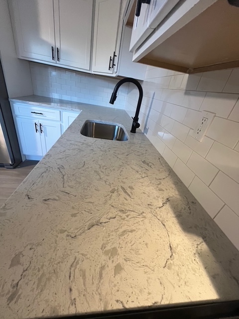 79 Beths Avenue, Unit 100 Bristol, CT 06010 - Photo 7 of 29 a close view of a sink in the kitchen