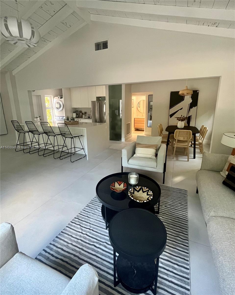 337 Southwest 23rd Road, Unit 1 Miami, FL 33129 - Photo 24 of 31 a living room with furniture and wooden floor