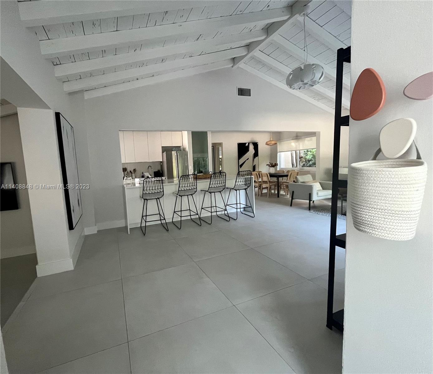 337 Southwest 23rd Road, Unit 1 Miami, FL 33129 - Photo 5 of 31 a living room with furniture and a window
