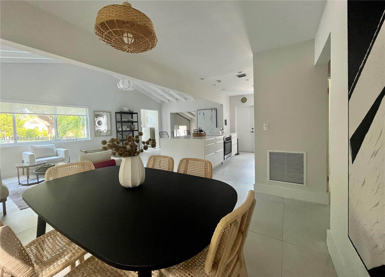 337 Southwest 23rd Road, Unit 1 Miami, FL 33129 - Photo 7 of 31 a view of a dining room with furniture