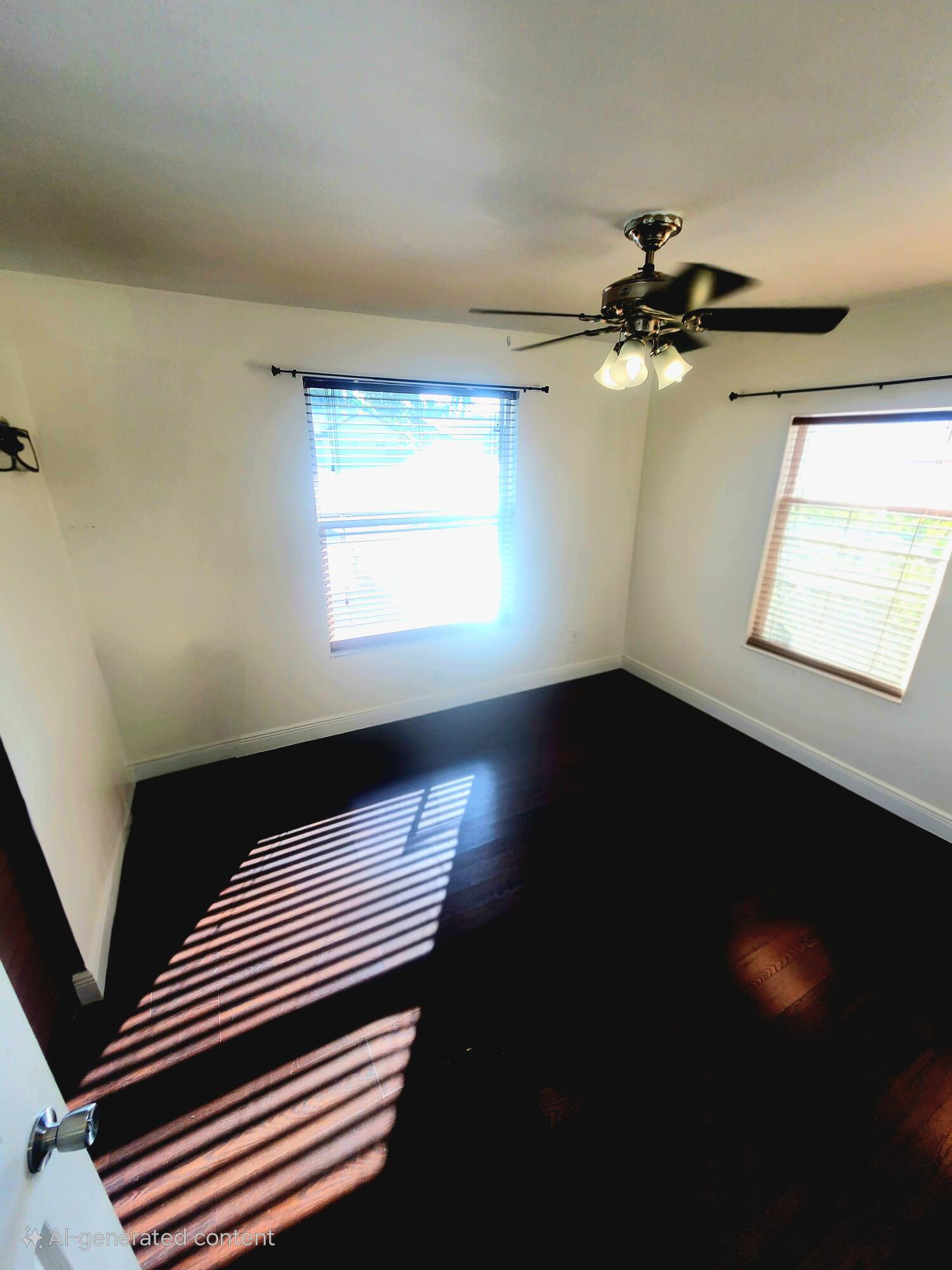 19323 Carolina Circle Boca Raton, FL 33434 - Photo 23 of 24 a view of room window and wooden floor