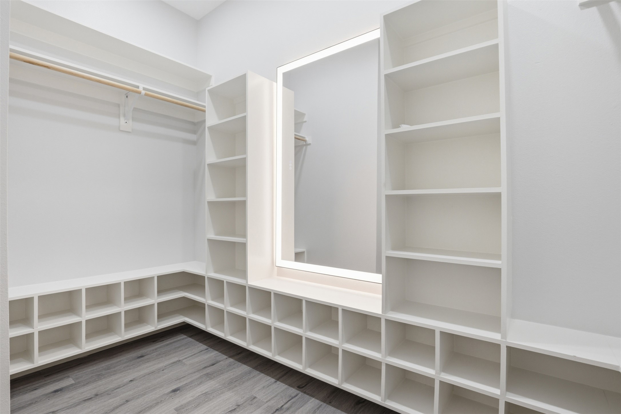123 Los Robles Road Elgin, TX 78621 - Photo 15 of 21 Custom closet system featuring extensive shelving, cubbies, and hanging rods
