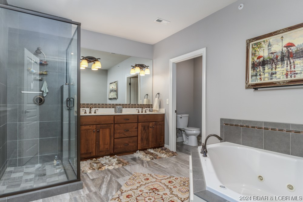 3168 Twin Rivers Point, Unit 1E Camdenton, MO 65020 - Photo 29 of 50 MASTER BATH WALK IN TILE SHOWER