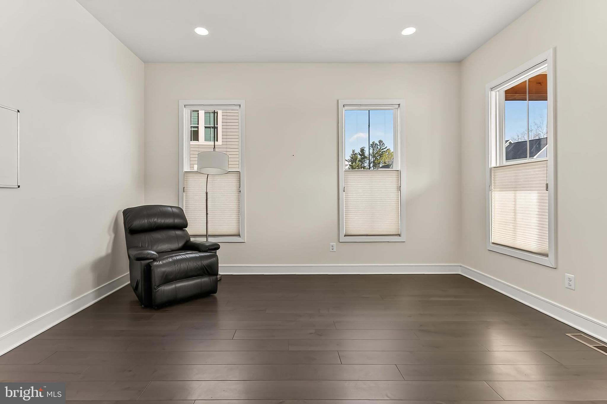41424 Gentle Wind Place Aldie, VA 20105 - Photo 11 of 83 a living room with furniture and a window