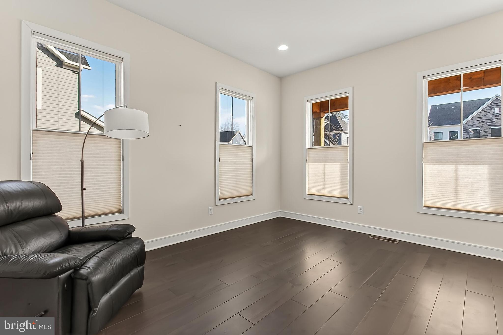 41424 Gentle Wind Place Aldie, VA 20105 - Photo 12 of 83 a living room with furniture and a window