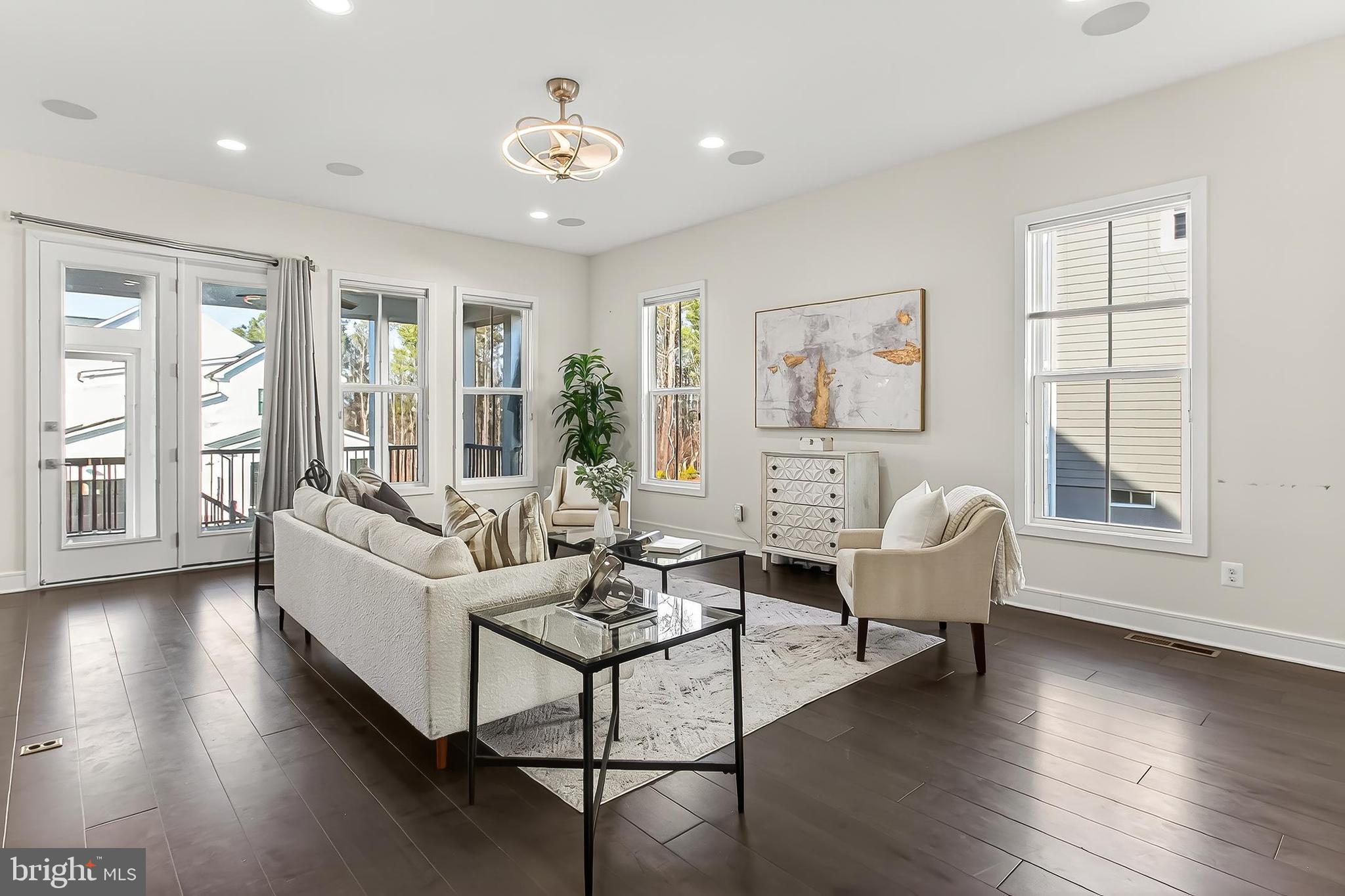 41424 Gentle Wind Place Aldie, VA 20105 - Photo 17 of 83 a living room with furniture and a large window