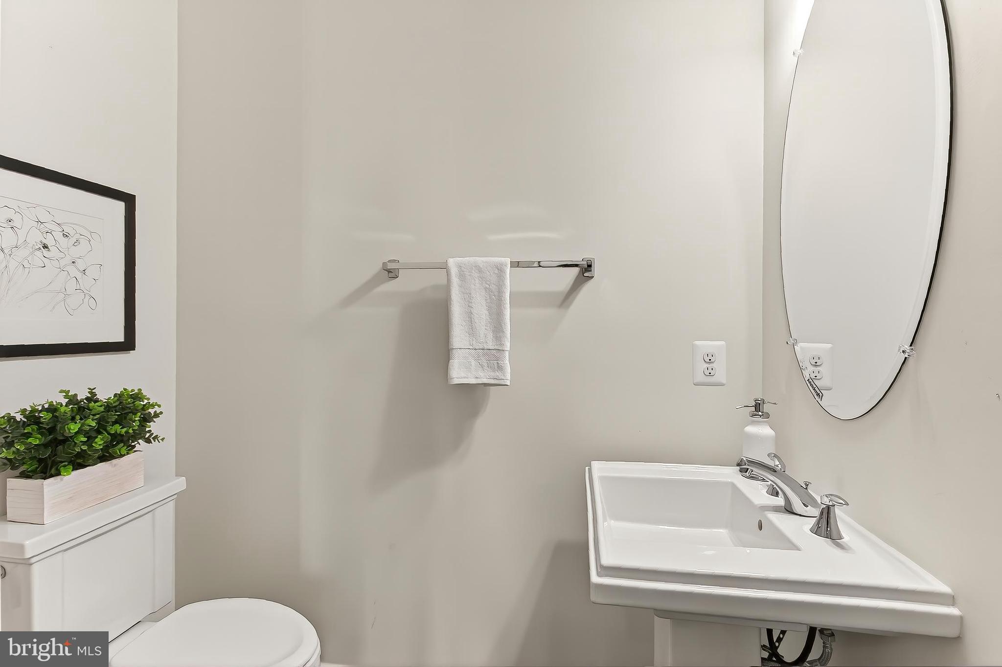 41424 Gentle Wind Place Aldie, VA 20105 - Photo 35 of 83 a bathroom with a sink mirror and toilet