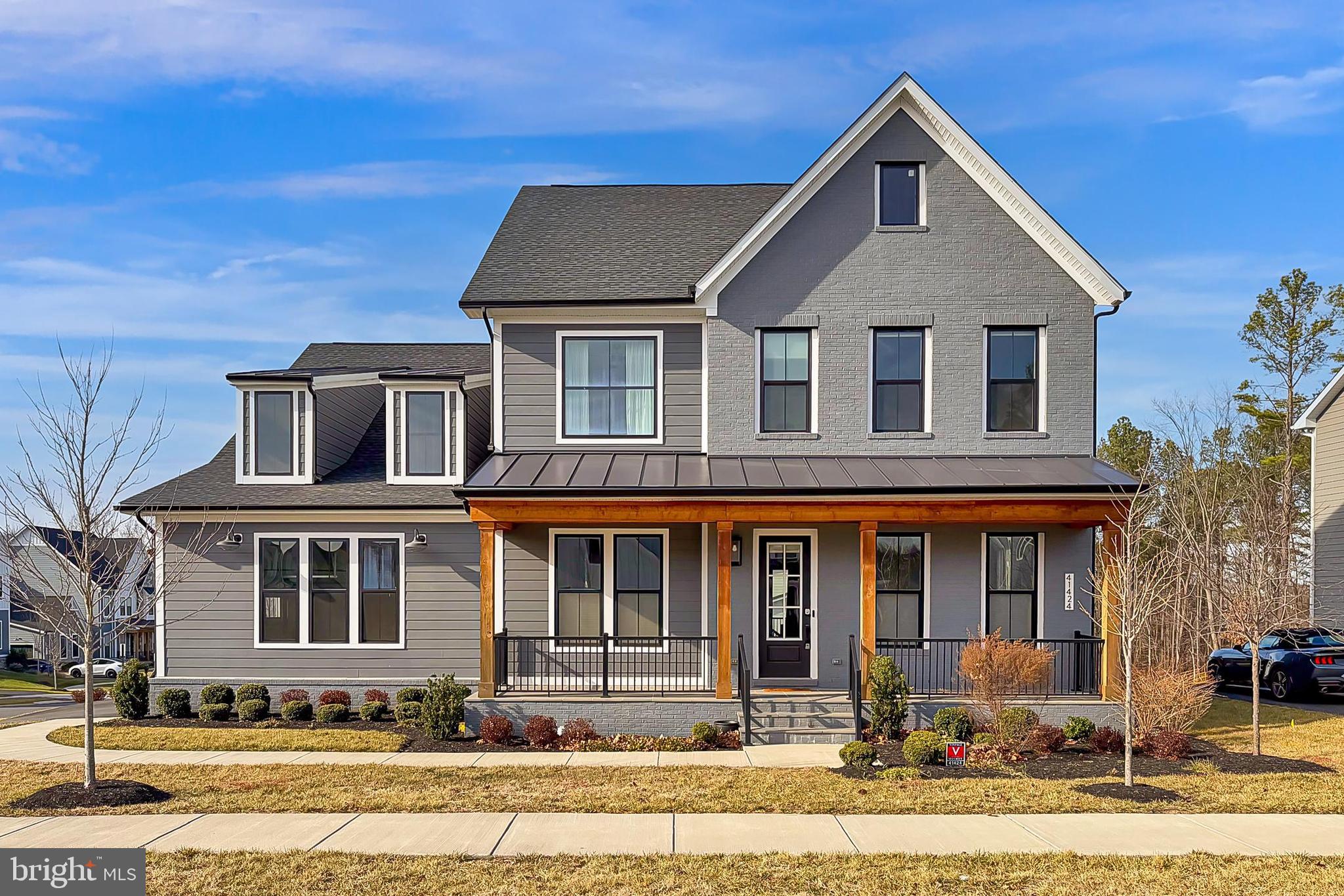 41424 Gentle Wind Place Aldie, VA 20105 - Photo 4 of 83 a front view of a house with a yard