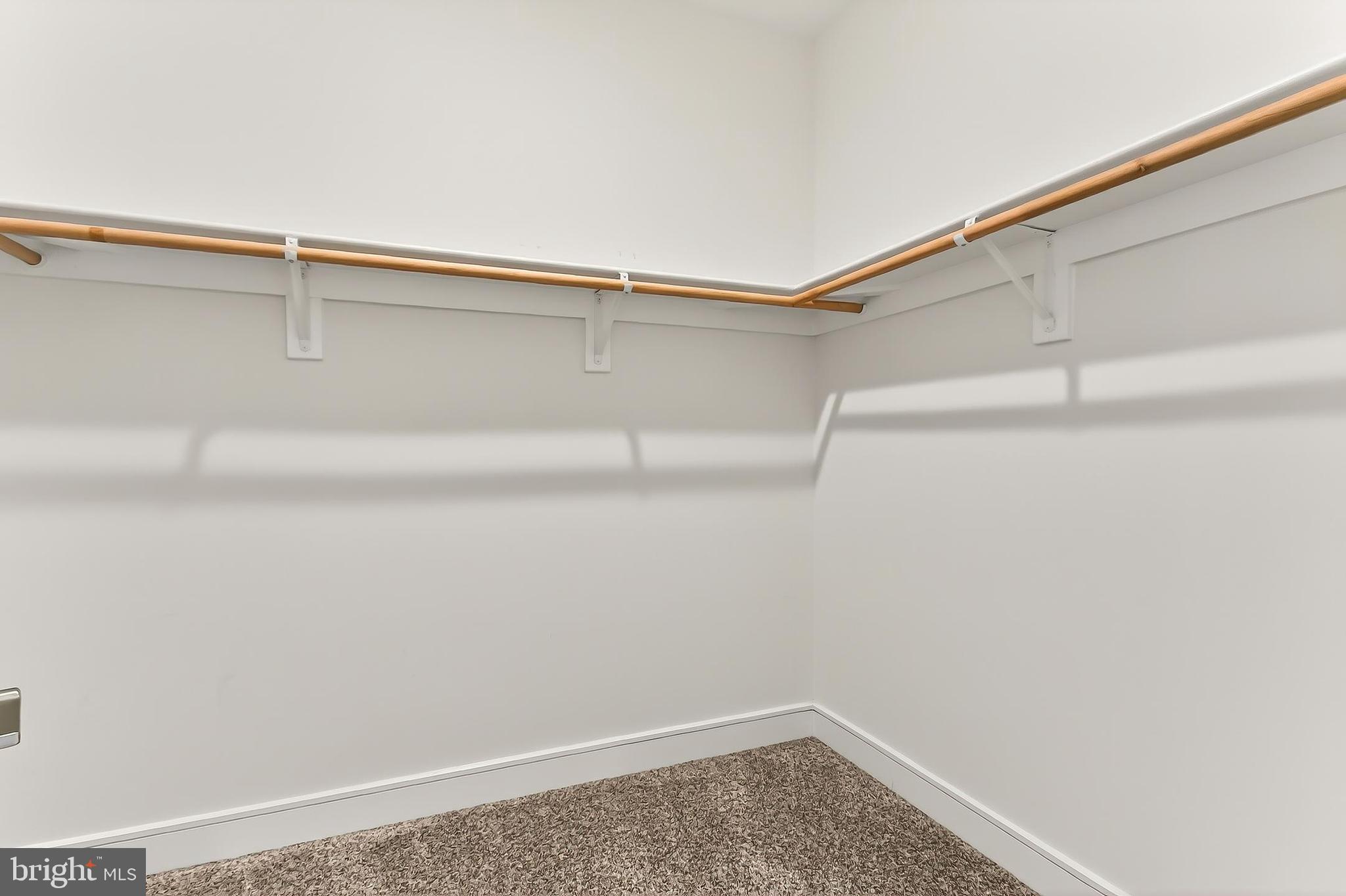 41424 Gentle Wind Place Aldie, VA 20105 - Photo 50 of 83 a view of a room with racks on the wall