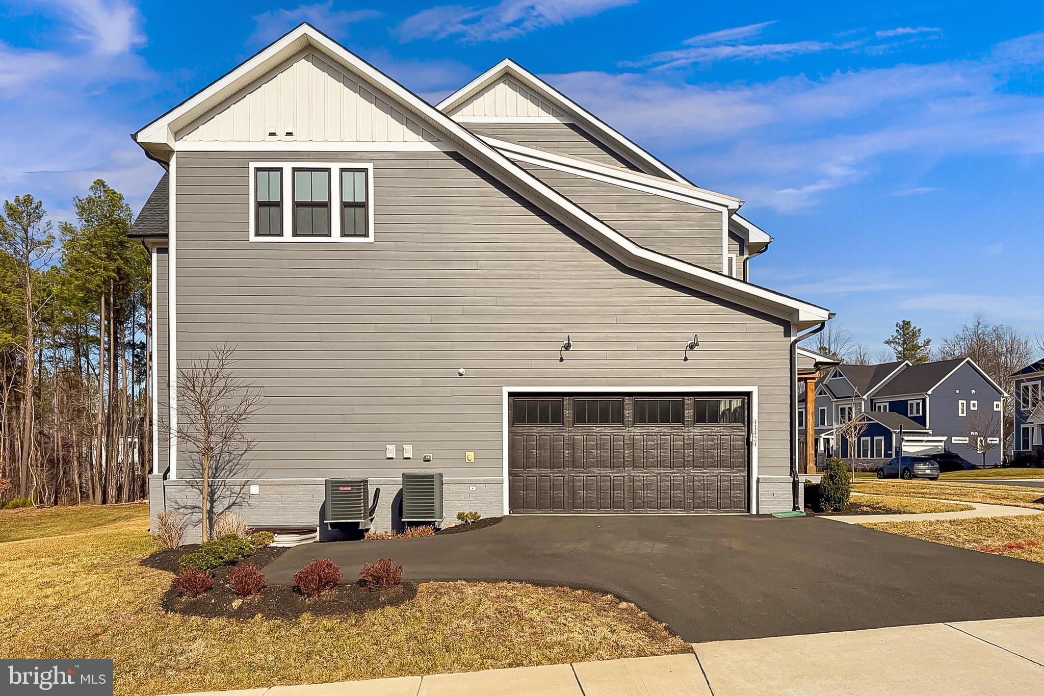 41424 Gentle Wind Place Aldie, VA 20105 - Photo 83 of 83 a front view of a house with garden