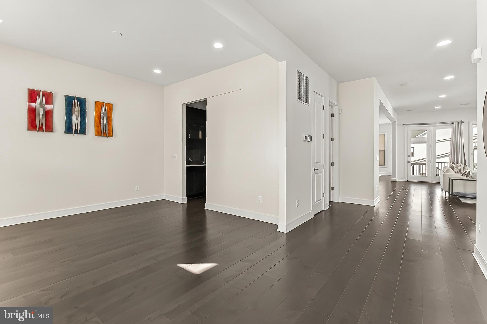 41424 Gentle Wind Place Aldie, VA 20105 - Photo 9 of 83 a view of a livingroom with wooden floor
