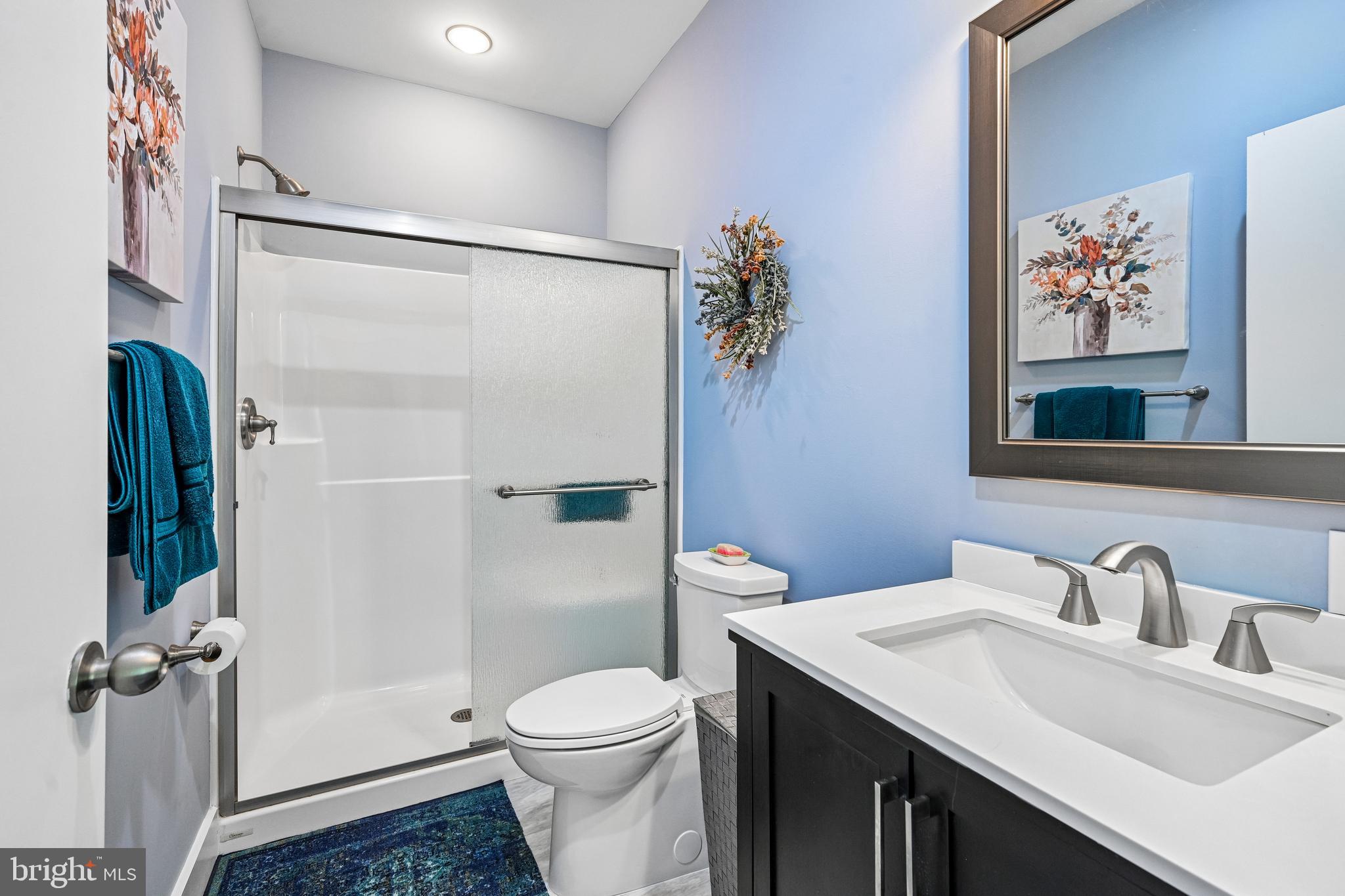 11 Forklanding Road Cinnaminson, NJ 08077 - Photo 24 of 77 a bathroom with a sink toilet and shower