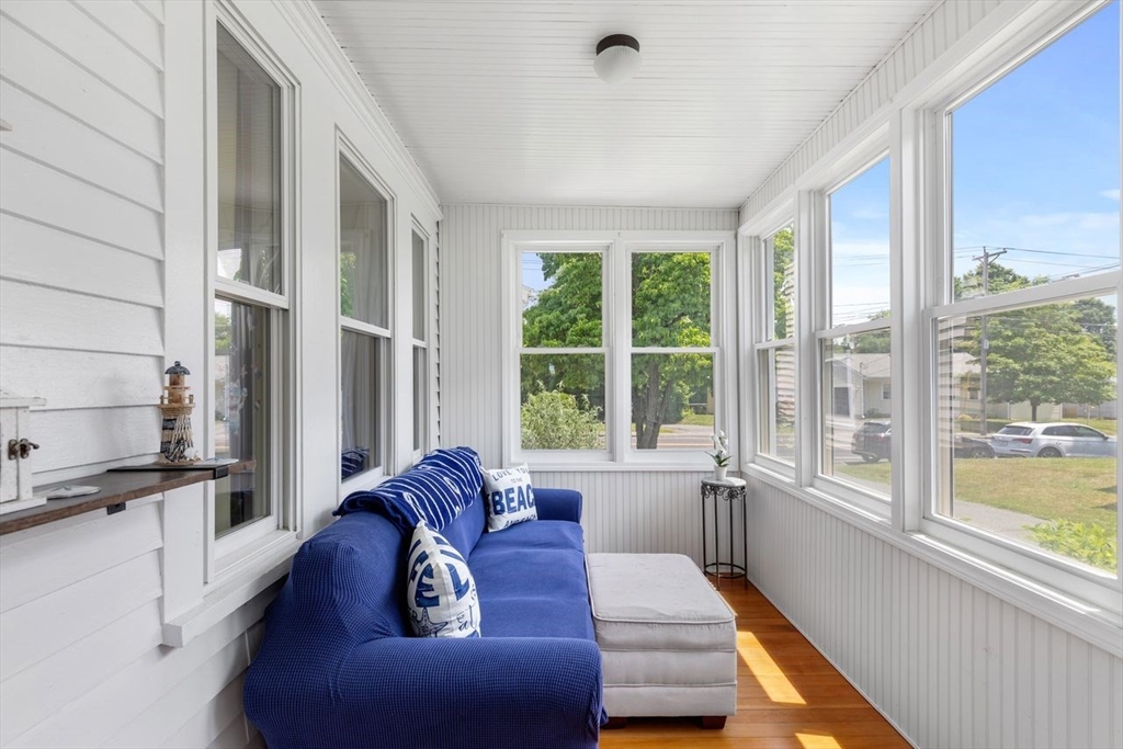 1012 Washington Street Whitman, MA 02382 - Photo 14 of 37 a living room with furniture and a large window