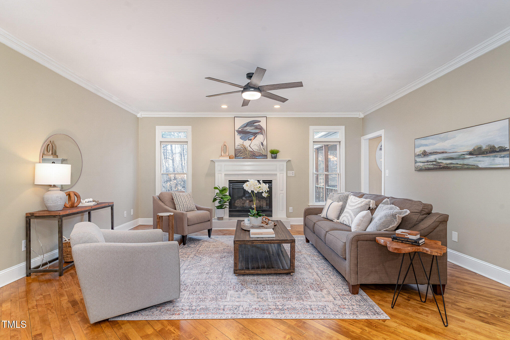 5000 Celbridge Place Raleigh, NC 27613 - Photo 7 of 44 a living room with furniture chandelier and a fireplace