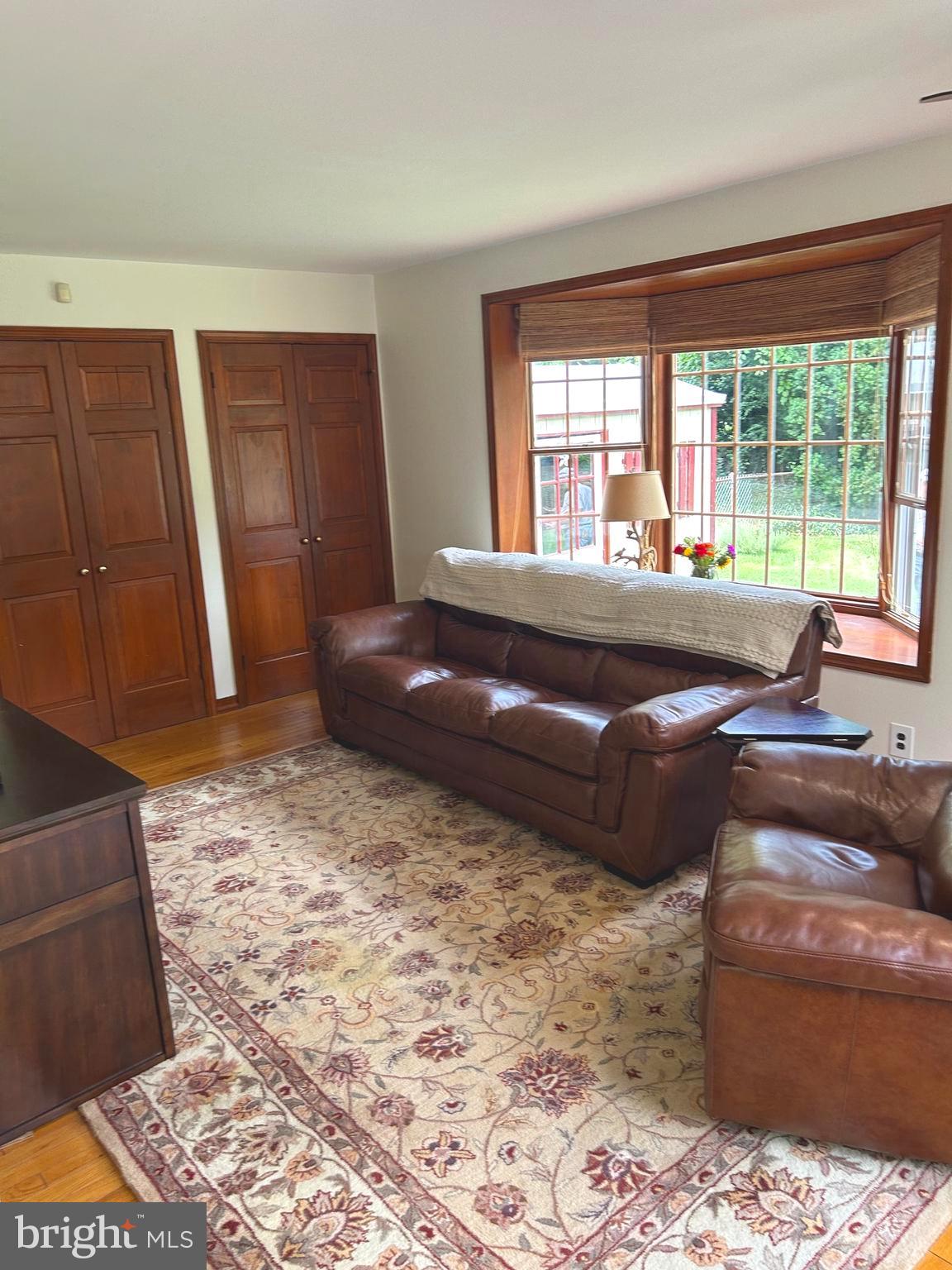 609 Boyer Road Cheltenham, PA 19012 - Photo 12 of 24 a living room with furniture and a large window