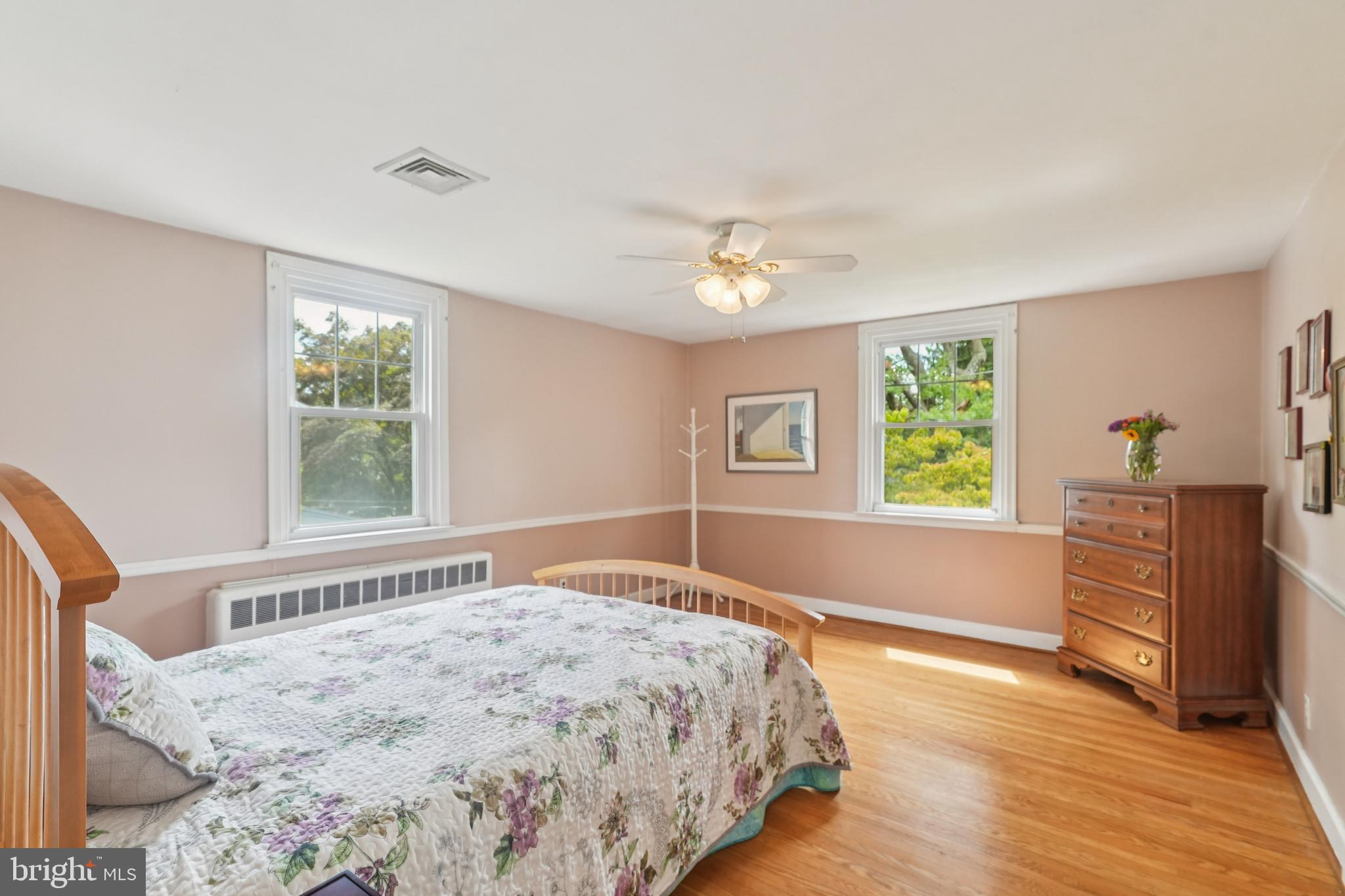609 Boyer Road Cheltenham, PA 19012 - Photo 18 of 24 a bedroom with a bed and a dresser