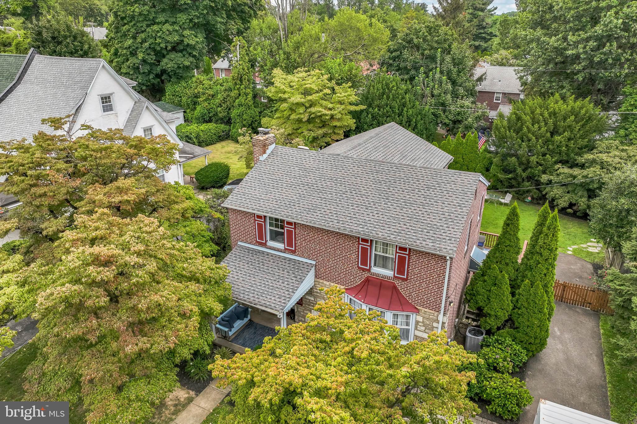 609 Boyer Road Cheltenham, PA 19012 - Photo 24 of 24 an aerial view of a house with yard and trees in the background