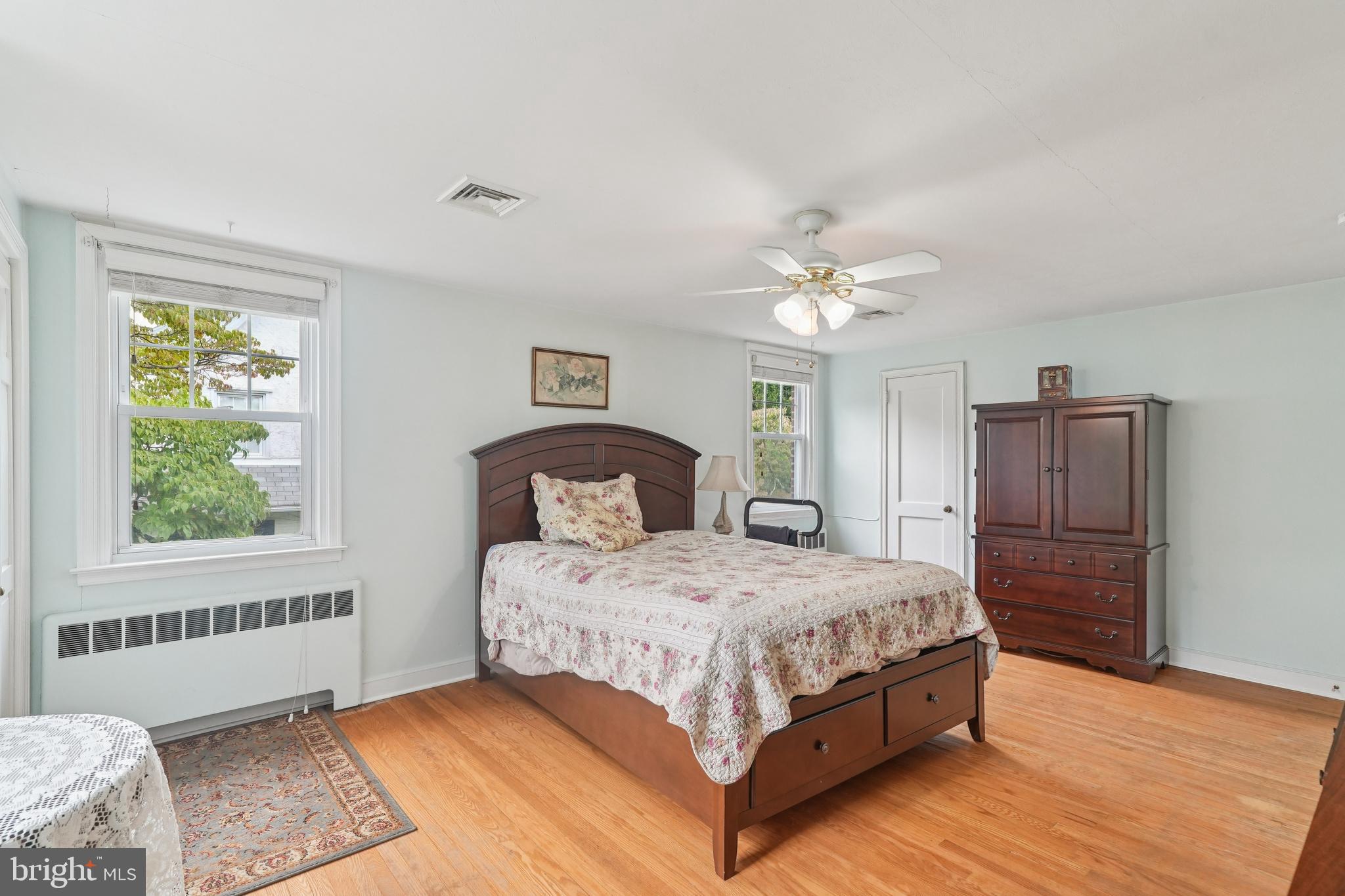 609 Boyer Road Cheltenham, PA 19012 - Photo 8 of 24 a bedroom with a large bed and a window