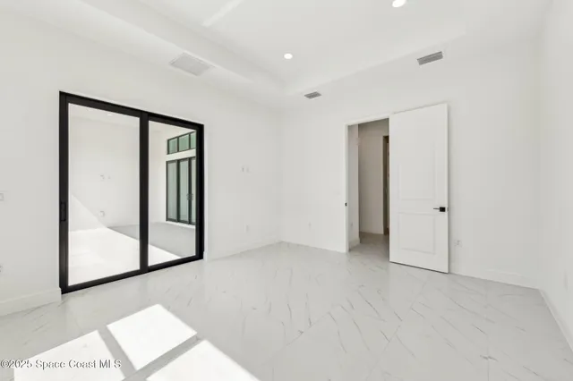 a bathroom with a toilet sink and a mirror