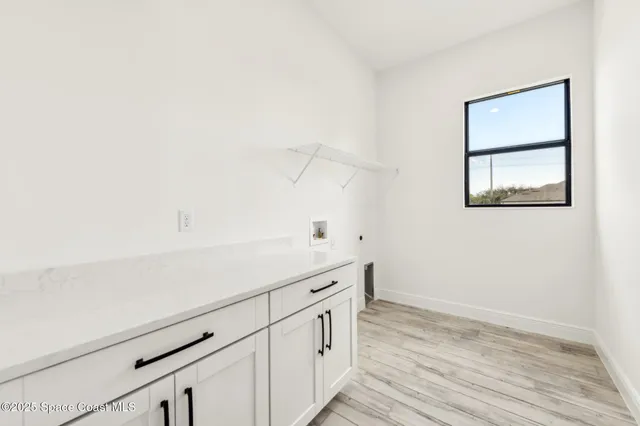 a view of a garden and swimming pool