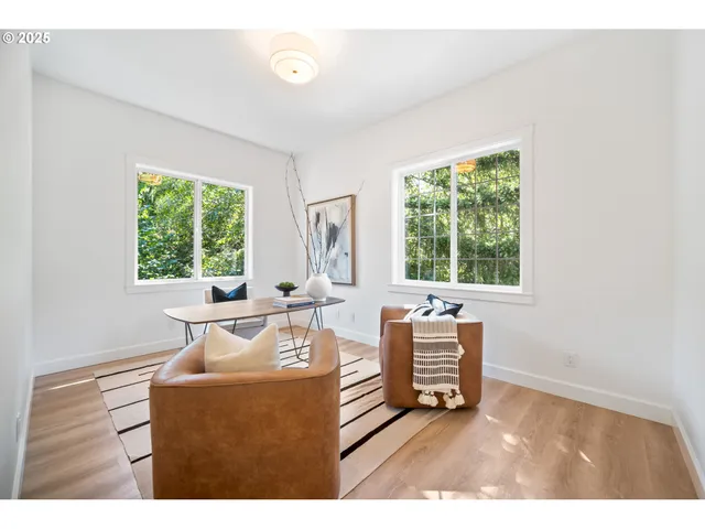 a living room with furniture and window