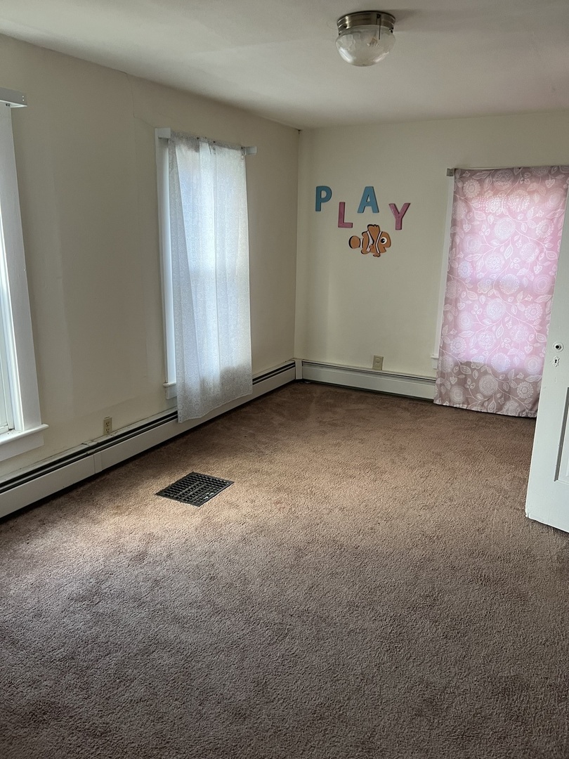 4304 West Lily Creek Road Freeport, IL 61032 - Photo 35 of 53 a view of an empty room with a window