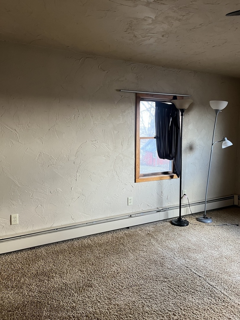 4304 West Lily Creek Road Freeport, IL 61032 - Photo 45 of 53 a view of a livingroom with wooden floor and a window
