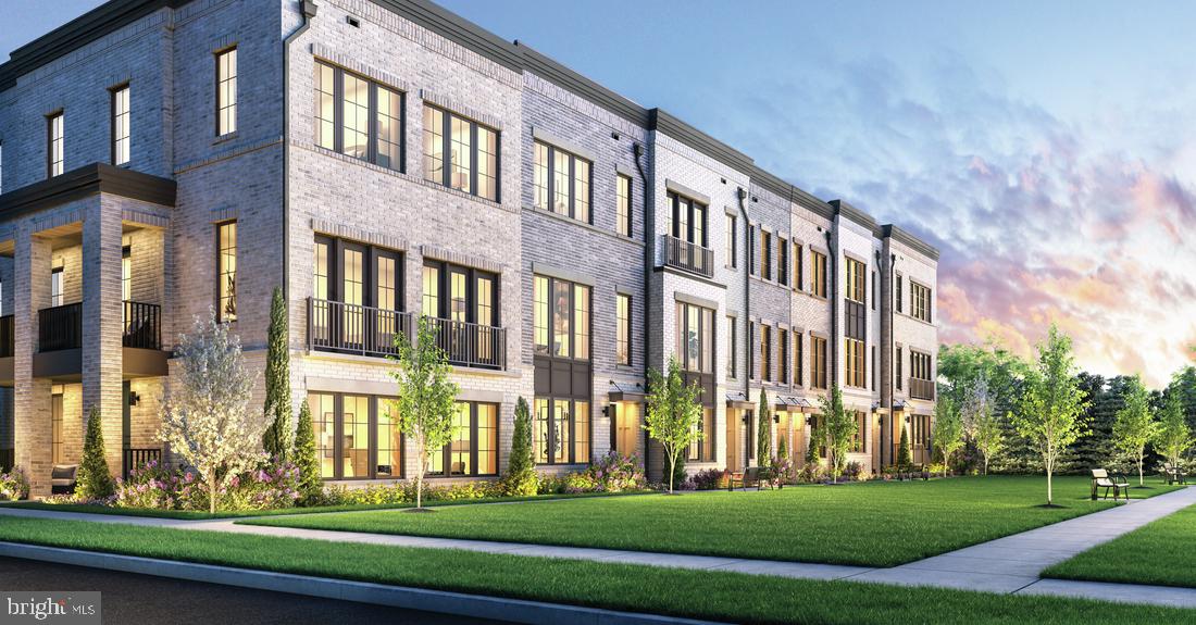 8616 Erdem Place Chevy Chase, MD 20815 - Photo 1 of 12 a view of a building with a yard