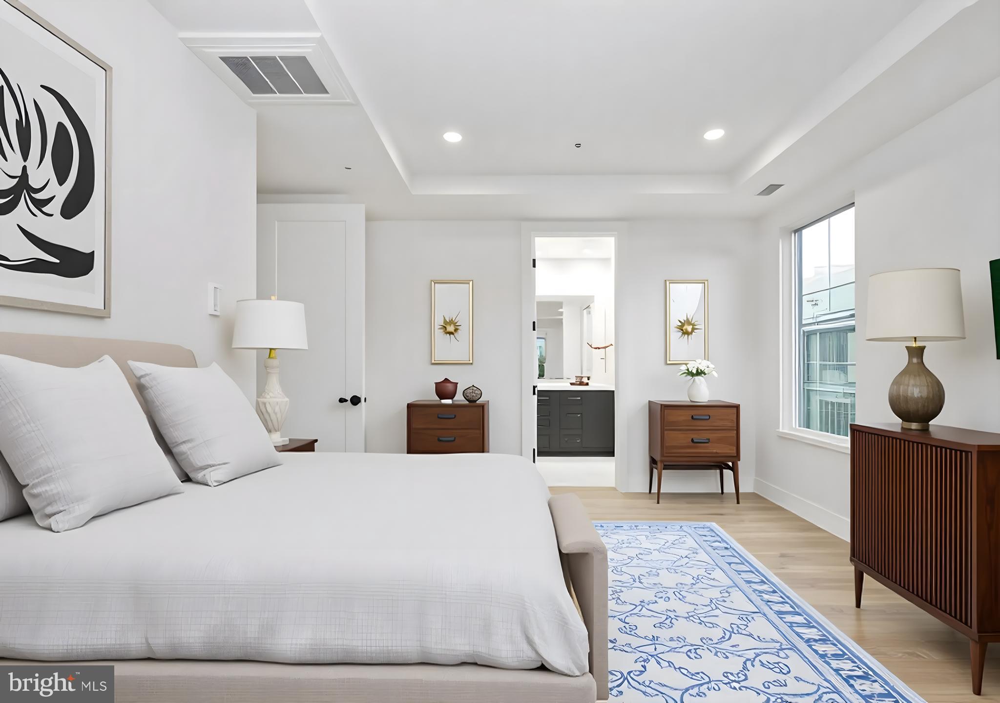 8616 Erdem Place Chevy Chase, MD 20815 - Photo 5 of 12 a bedroom with furniture and a rug