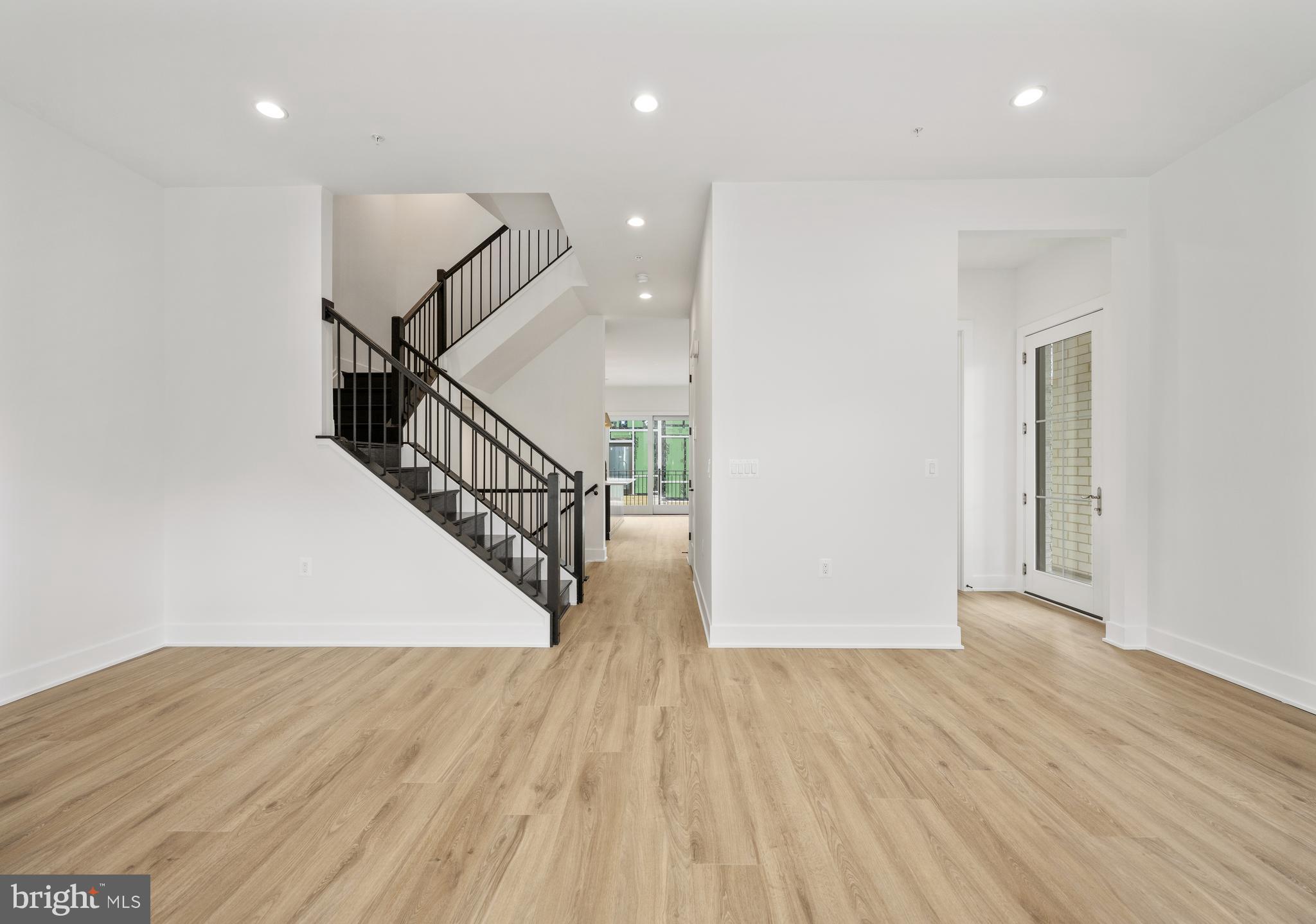 8616 Erdem Place Chevy Chase, MD 20815 - Photo 7 of 12 a view of entryway with wooden floor