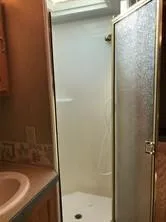 a bathroom with a sink and a shower