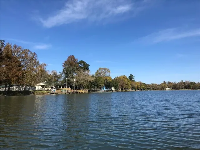a view of lake with green space