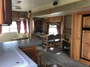 a view of a living room and bathroom