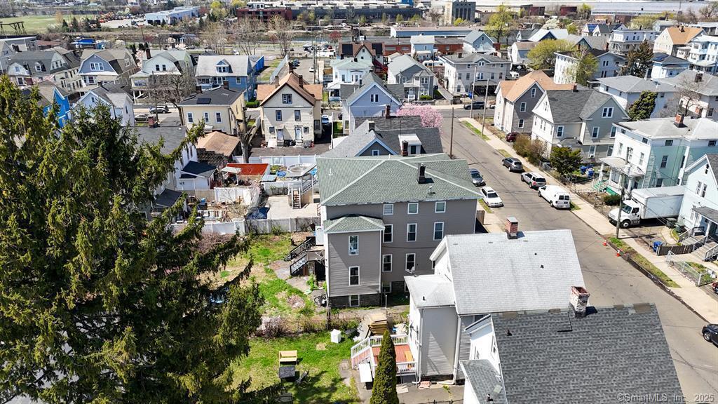 40 Jane Street Bridgeport, CT 06608 - Photo 16 of 29 an aerial view of a house with a swimming pool